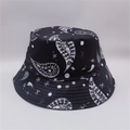 Close-up of black bucket hat featuring white paisley leaf prints and street style star motifs - M (56-58cm) / Black Base White Paisley Star (25#)