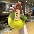 Cute plush persimmon keychain in yellow with green leaf and lucky charm tag - Yellow Persimmon Good News