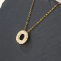 Gold plated alphabet necklace with round pendant featuring sparkling zircon on stone - Letter O (Pendant Only)