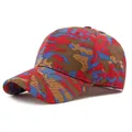Unisex baseball cap featuring a unique red, blue, and yellow camouflage patchwork design - Red Khaki Camouflage