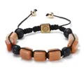 Handmade braided bracelet featuring orange agate, black lava stones and golden mandala charm - Orange Agate / Orange