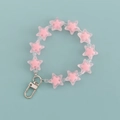 Pink translucent star bead keychain with silver clasp on a soft blue background - Pink and Clear Star Style (B344-1)