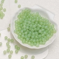 6mm light green translucent round glass beads for DIY jewelry in a white shell bowl - Light Aventurine Chalcedony Beads (6mm)