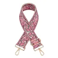 Close-up of jacquard paisley bag strap with golden metal swivel hooks and adjustable buckle - Pink