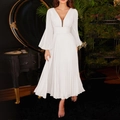 Elegant white pleated maxi dress featuring a deep V-neck and stylish flared long sleeves - M / White