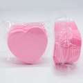 Pink heart-shaped compressed facial sponges made of natural wood pulp in bulk packaging - Pink Heart 60*6mm 50 Pcs