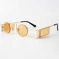 Lunettes steampunk avec monture en métal doré et verres ronds oranges au style gothique chic - Verres Thé Clair
