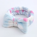 Detail of blue and white striped plush headband with pink polka dots and large bow - Blue Rabbit
