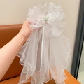 White bridal hair bow with sheer tulle veil, faux pearls and butterfly embroidery - Floral Butterfly Floating Yarn