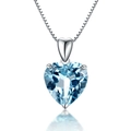 Silver necklace featuring a heart-shaped blue gemstone pendant on a box chain - Heart-shaped Sapphire Necklace Xl-20