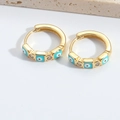Pendientes de aro dorados con ojo de esmalte azul y circonitas microincrustadas - Azul