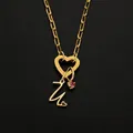 Elegant golden titanium steel heart clasp necklace with initial pendant and pink gemstone - Letter U