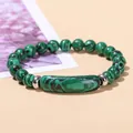 Minimalist green malachite beaded bracelet with large oval stone and silver accents - Malachite
