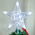 Close-up of clear LED Christmas tree star topper with internal lights on tree branch - 15CM/10 LEDs/OPP Bag / White