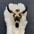 Macro view of luxury bull head acrylic pendant with gold plating and black finish - No.3 (Black & Gold)
