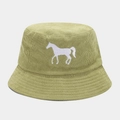 Close-up of white horse embroidery on green corduroy bucket hat texture and stitching - One Size / Yellow-Green