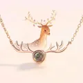 Detailed view of rose gold deer antler necklace with creative projection stone center - Smooth Antler Rose Gold