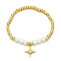 Golden beaded bracelet with pearls and zircon star pendant on white background - Eight-Pointed North Star Pendant