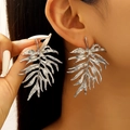 Chic silver palm leaf statement earrings with hollow-out design and polished finish - Silver Hollow Palm Leaf (A-887)
