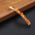 Golden bobby pin with natural orange crystal stone chips for elegant women's hairstyling - Red Aventurine