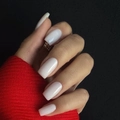 Glossy white medium square press-on nails shown on hand with a minimalist gold ring - Medium Square / White