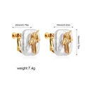 Detailed view of baroque pearl earrings with golden flower accents and measurements - Orchid