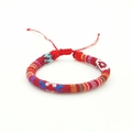 Handmade woven surfing bracelet in vibrant red and blue bohemian ethnic patterns - Size 18