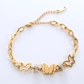 Bracelet élégant en acier inoxydable doré 18K avec breloque papillon et cristaux scintillants - Or