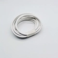 Close-up of a roll of 6mm white round leather cord for DIY bags and fashion accessories - White