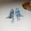 Vintage silver earrings with blue crystal butterfly wings and white pearl drop pendants - Blue Crystal Butterfly Pearl Drop Earrings