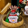 Detail of Christmas drawstring gift bag with snowman applique and plaid fabric closure - Snowman