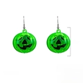 Close-up of LED glowing pumpkin earrings with detailed Jack-o'-lantern face engravings - Green
