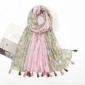 Detail of pink and olive green floral bali gauze scarf with decorative tassels and fringes - Pink