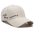 Cream white baseball cap with black embroidered calligraphy text on cotton twill - Light Beige