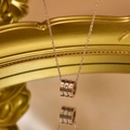 Minimalist rose gold stainless steel cylinder pendant necklace with sparkling zircon stone - Rose Gold Cylinder Roller Pendant