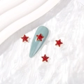 Star-shaped gold nail charms with red rhinestones on blue manicure background - Gold Red Zirconia