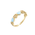 Detail of adjustable gold ring with light blue enamel hearts and micro zircon stones - Blue