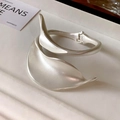 Minimalist matte silver cuff bracelet with organic leaf-shaped curves and hinge - Silver Matte Leaf Wrap Style