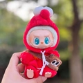 Labubu plush doll wearing a red hooded outfit and a brown bear crossbody bag - Red Crossbody Bag Sesame Bird Two-piece Set / First And Second Generation Keychains Are Compatible With La Cloth Dolls. Dolls Not Included.