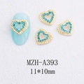 Vue détaillée du bijou d'ongle MZH-A393 cœur doré avec strass bleus 11x10mm - Style Cœur en Zircon Bleu Mer Évidé (A393)