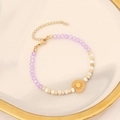 Detail of beaded heart bracelet with purple faceted stones and gold sun charm pendant - Purple(4#)