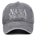 Close-up of NANA embroidery and floral patterns on washed dark gray baseball cap - Adjustable / Gray