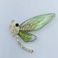 Golden dragonfly brooch with green enamel wings and clear crystals for women - Light KC Gold Emerald Dragonfly