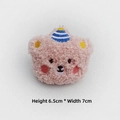 Detail of pink curly plush bear accessory with embroidery hat, sized 6.5cm by 7cm - Pink