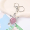 Close-up of pink crystal turtle keychain with sparkling rhinestones and silver metal finish - Turtle 1 (Pink)
