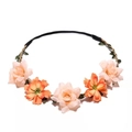 Handmade flower wreath headband with pink roses and orange lilies on a woven vine - Orange