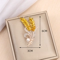 Spilla a spiga di grano dorata con cristalli gialli e perla in misura 6x3cm - Design a Spiga di Grano / Stile spiga di grano
