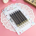 Set of 6 black birthday candles with gold stars, 8cm long with golden holders - Black Five-pointed Star