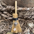 Mini witch broom charm with silver turtle and rose quartz over natural bark background - 10cm / Straw Broom + Turtle + Random Stone