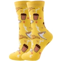 Close-up of yellow mid-calf cotton socks with coffee and croissant pattern designs - EU 36-42 / Yellow Coffee